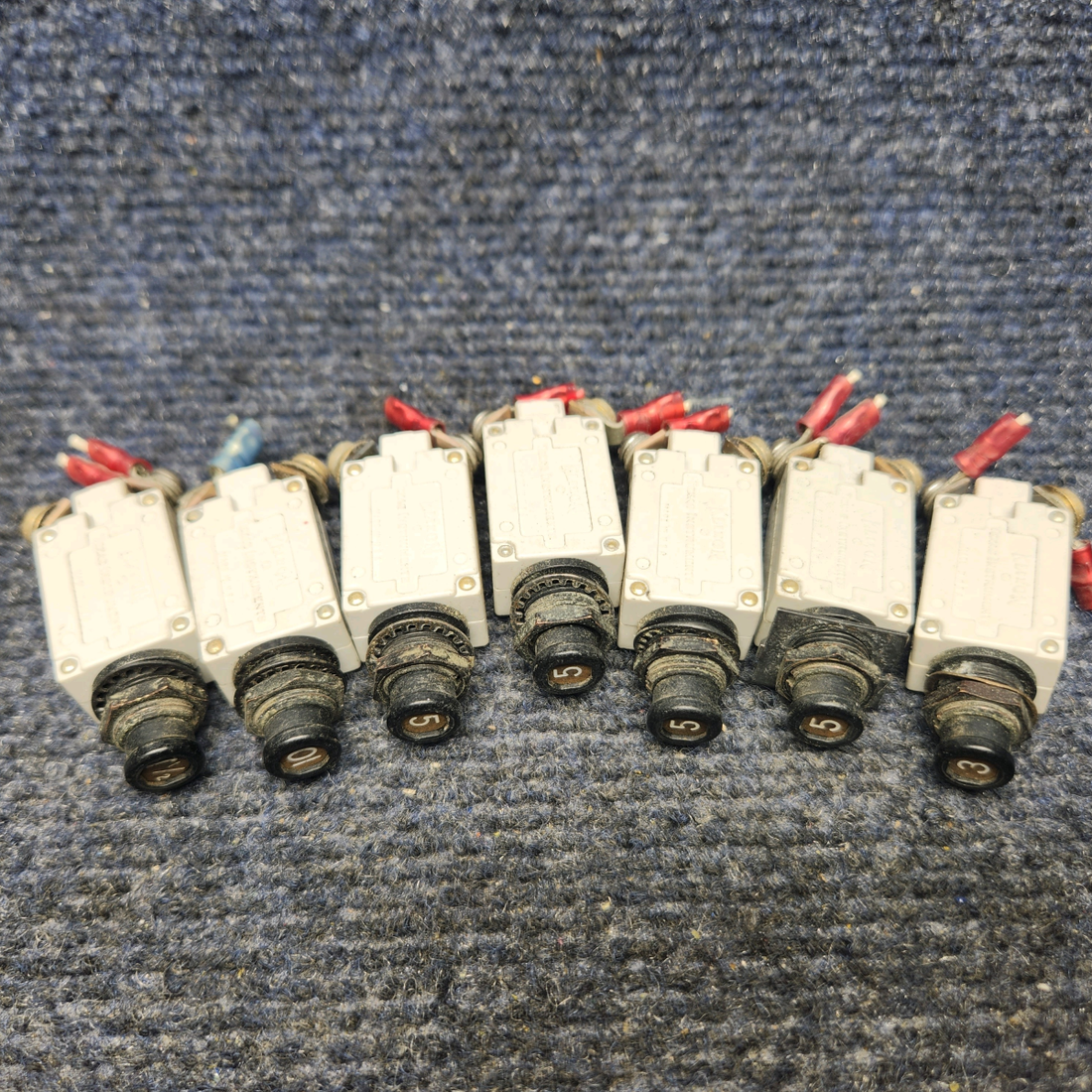 Used aircraft parts for sale, 7277-2-5 / 7277-2-7 PIPER PA28-161 Warrior III CIRCUIT BREAKER (SET OF SEVEN) 4-5A/1-3A/1-7A/1-10A.