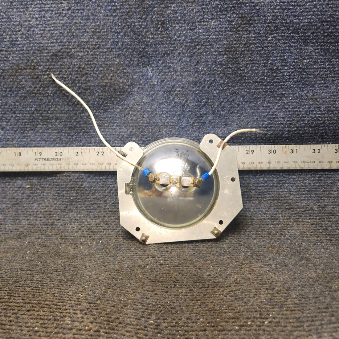 Used aircraft parts for sale, 0423542-6 Cessna 172F Landing Light Bracket Assembly with bulb