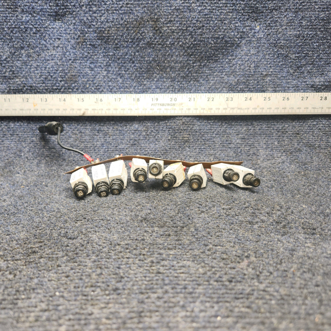 Used aircraft parts for sale, 7274-2-10 , 7277-2-5 , 7277-2-2 klixon Beechcraft A24R Circuit Breaker 2-10AMP/ 5-5AMP / 2-2AMP. Total Nine