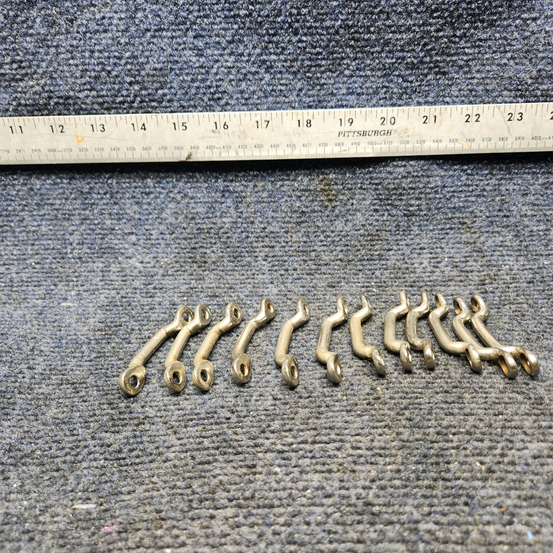 Used aircraft parts for sale, 43977-10 Cessna FOOTMAN LOOP "PRICE FOR TWO"