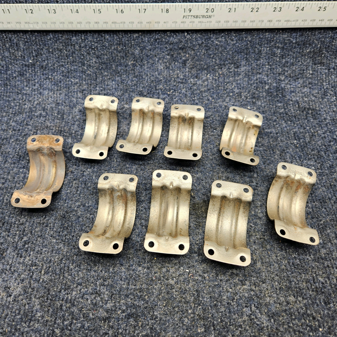 Used aircraft parts for sale, 0750161-25 Texas Several EXHAUST RISER CLAMP HALF 1.75 PRICE PER EACH