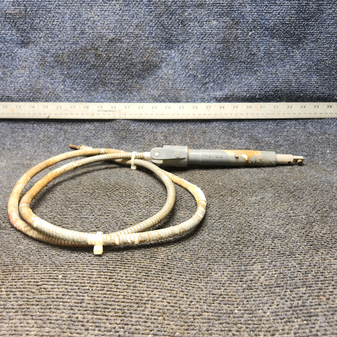 Used aircraft parts for sale, 35-521212-1, 35-521212-10 BEECHCRAFT F35 Flap Actuator Housing with Piston  Includes Cable – LH Side