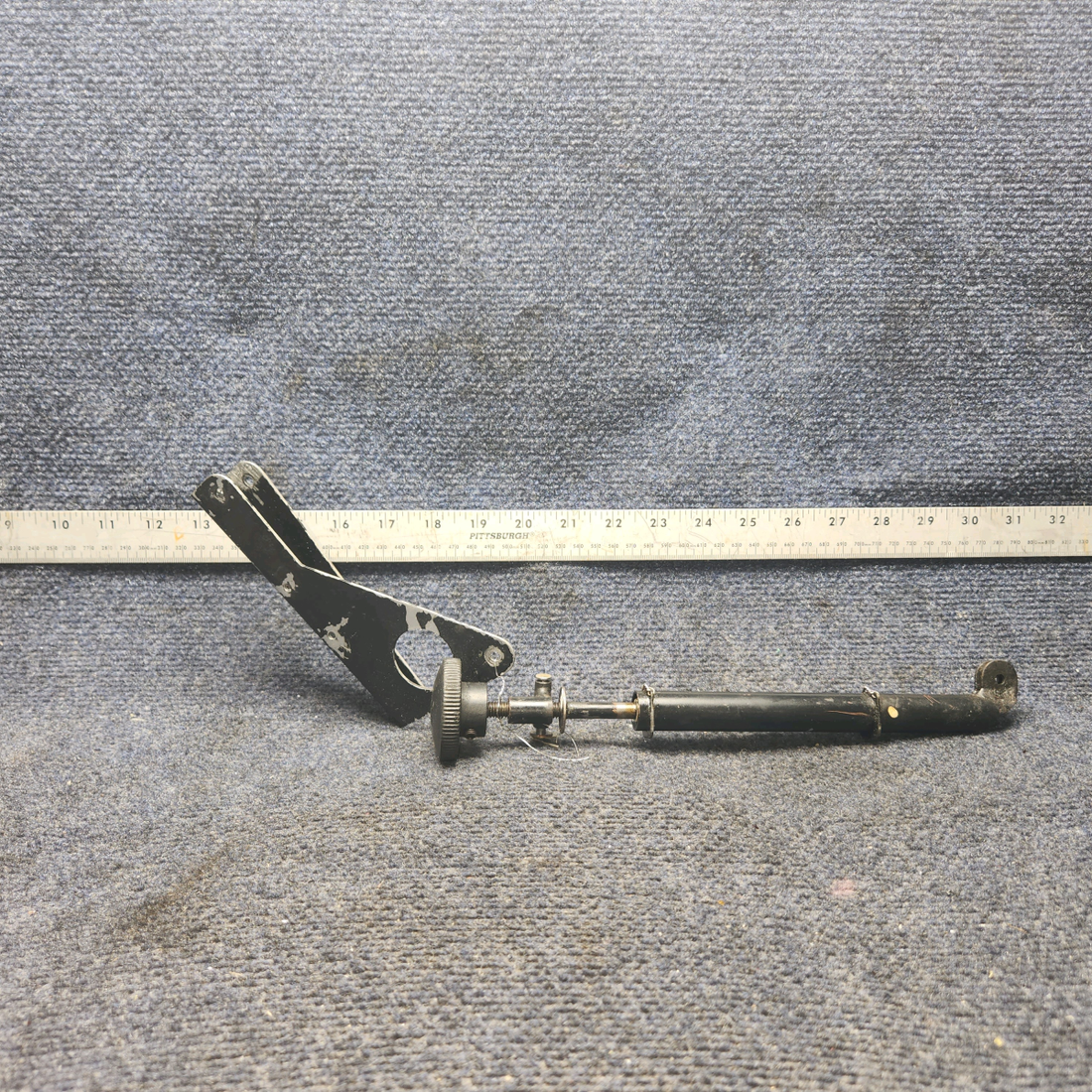 Used aircraft parts for sale, 62829-000 Piper PA28-140 Rudder Trim Shaft Assy With Braket.