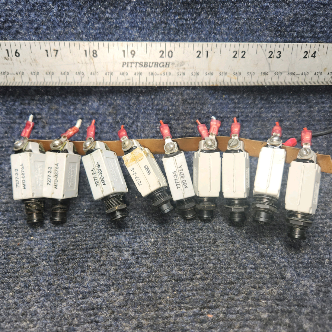 Used aircraft parts for sale, 7274-2-10 , 7277-2-5 , 7277-2-2 klixon Beechcraft A24R Circuit Breaker 2-10AMP/ 5-5AMP / 2-2AMP. Total Nine
