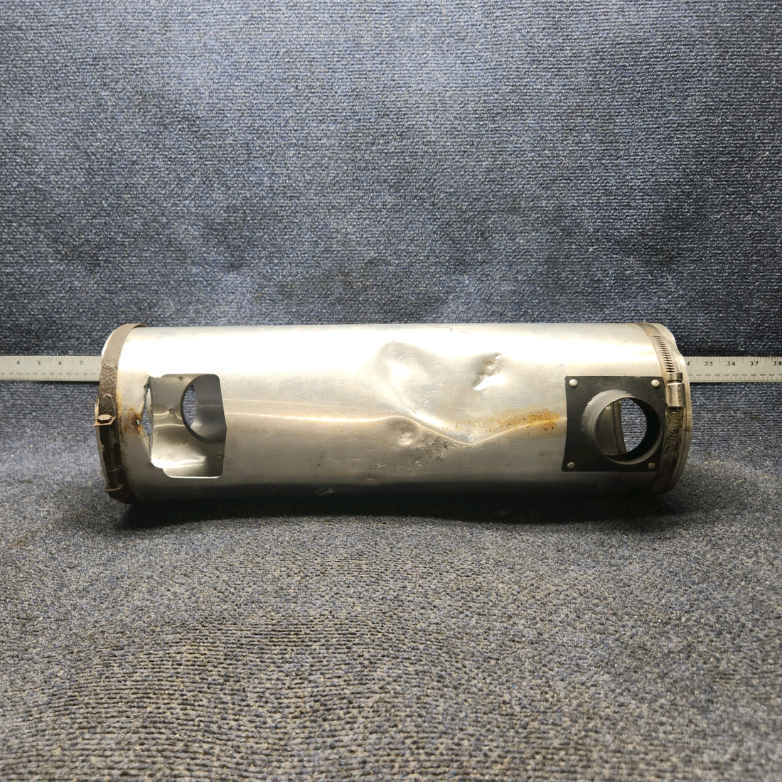 Used aircraft parts for sale, 66704-002 Piper PA28-140 Muffler Shroud- Has dents