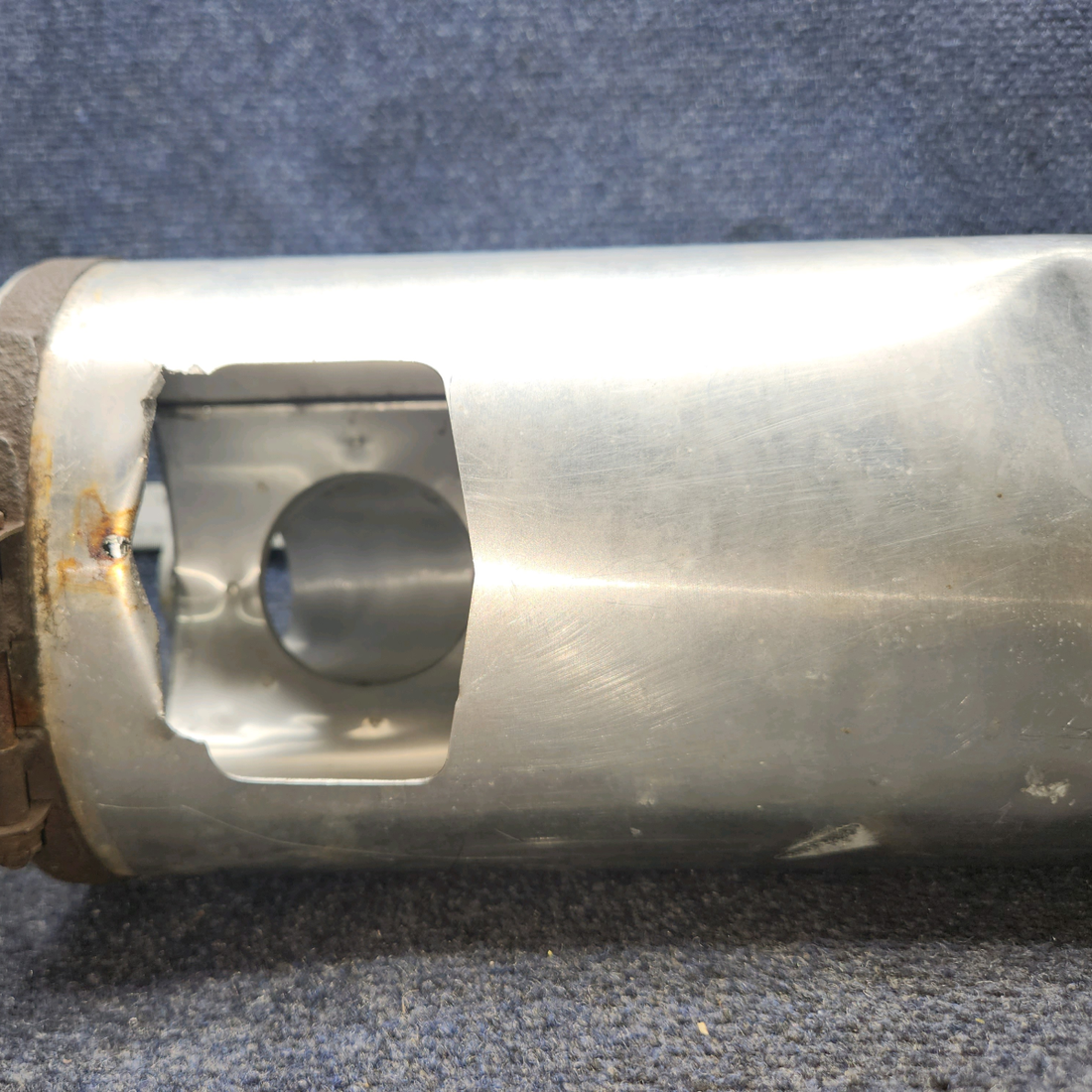 Used aircraft parts for sale, 66704-002 Piper PA28-140 Muffler Shroud- Has dents