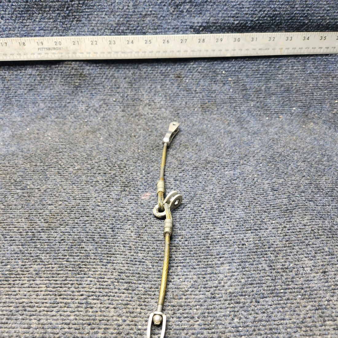 Used aircraft parts for sale, 65774-000 Piper PA28-140 Cable Seatbelt Center Attach