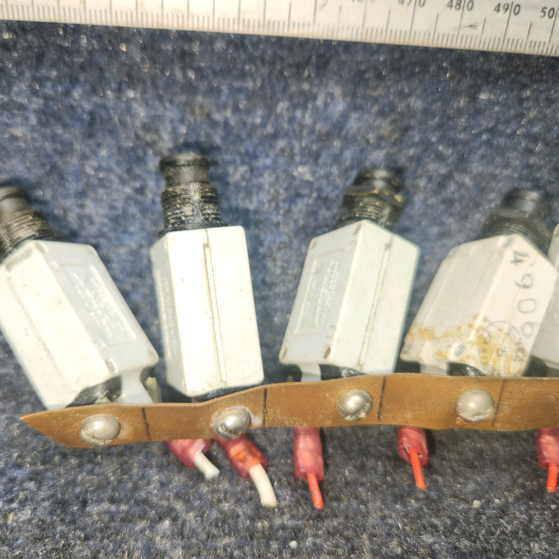 Used aircraft parts for sale, 7274-2-10 , 7277-2-5 , 7277-2-2 klixon Beechcraft A24R Circuit Breaker 2-10AMP/ 5-5AMP / 2-2AMP. Total Nine