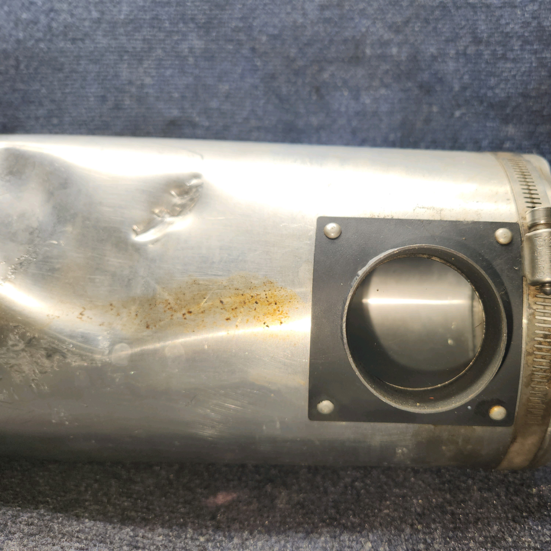 Used aircraft parts for sale, 66704-002 Piper PA28-140 Muffler Shroud- Has dents